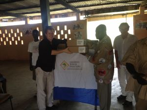 The CHRF team presents much needed medication to local clinics in Ghana. 