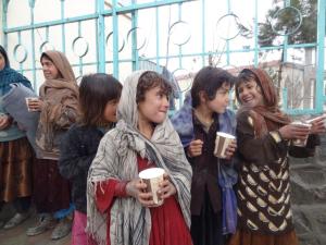 Children in Afghanistan smiling because of CHRF's food delivery! 